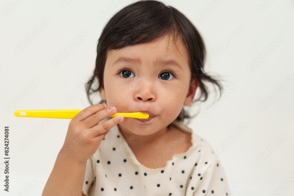 toddler girl brushes teeth with tooth brush toddler girl brushes teeth with tooth brush