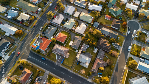 Photos Aerial view of a suburban neighborhood with a construction site in the center, s