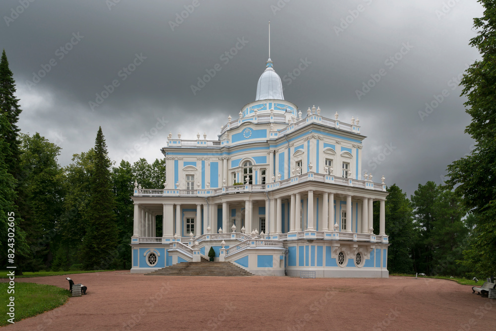 Obraz premium The Sliding Hill Pavilion in the upper park of the Oranienbaum Palace and Park Ensemble on a sunny summer day, Lomonosov, St. Petersburg, Russia