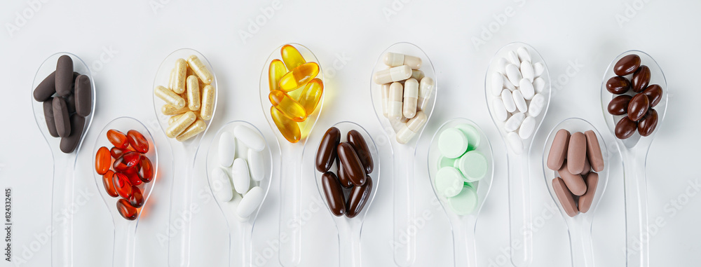 Φωτογραφία Various vitamin and mineral pills, food supplement health product in transparent