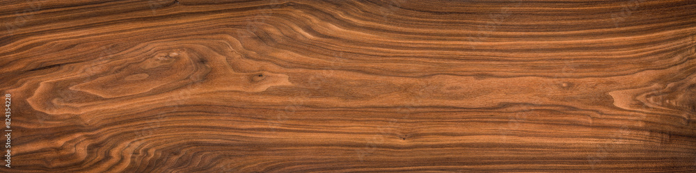 Super long walnut planks texture background.Walnut wood texture.Texture element. Super long walnut planks texture background.Walnut wood texture.Texture element.