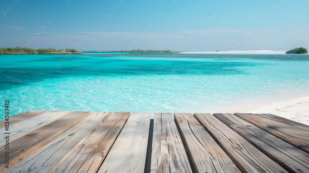 Modern wooden podium set against a backdrop of a turquoise lagoon and white sandy shore