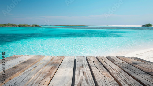 Modern wooden podium set against a backdrop of a turquoise lagoon and white sandy shore