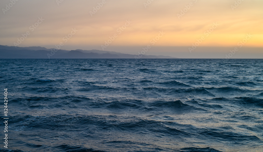 Fototapeta premium sunset over the mountains and sea. Cyprus