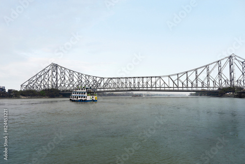 Howrah Bridge, spanning the Hoogli River in Kolkata, West Bengal, is an iconic engineering marvel and major landmark. Howrah Bridge, Kolkata, West Bengal, India