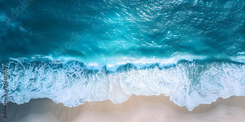 A wave of the ocean is breaking against a blue background