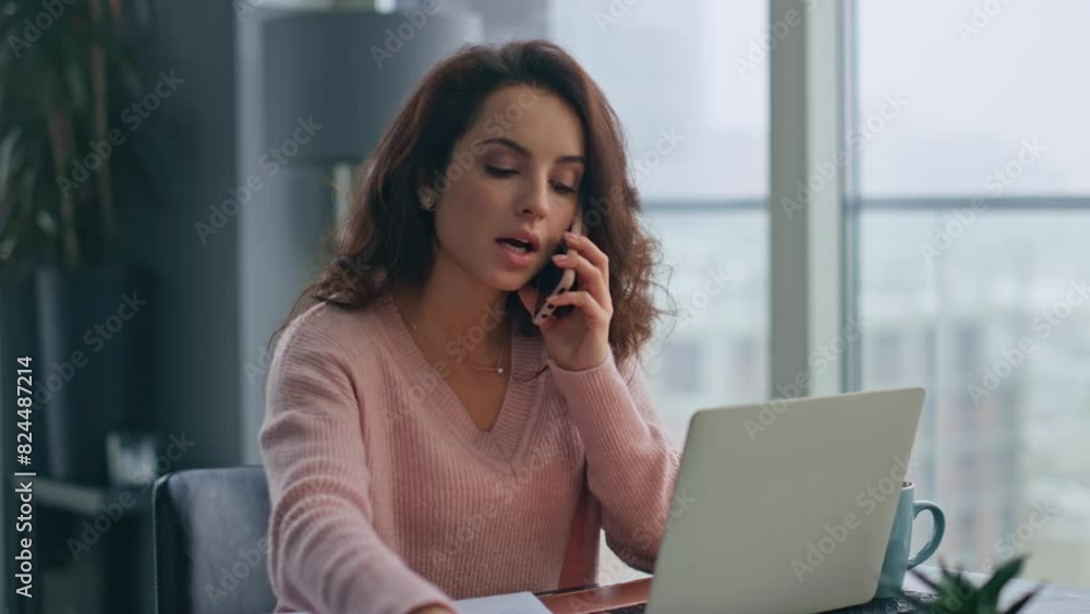 Financial manager talking smartphone at home desk closeup. Businesswoman working Financial manager talking smartphone at home desk closeup. Businesswoman working