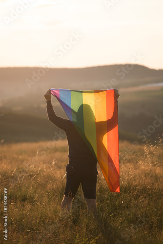 Young man with LGBT flag.