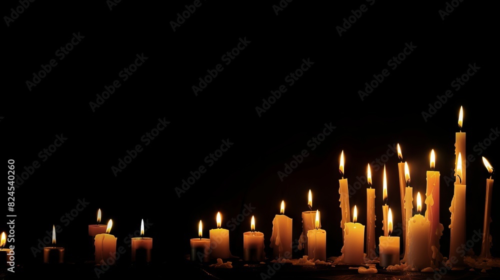 candles with copy space on dark background candles with copy space on dark background