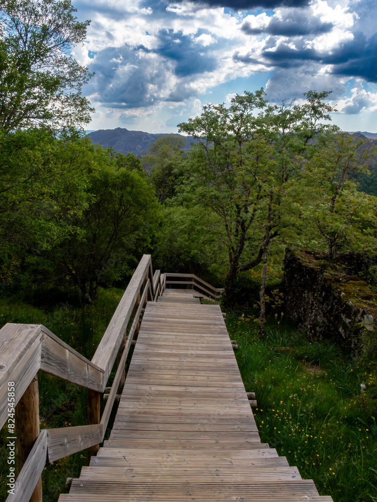 Access walkway to the viewpoint of the Pitões das Júnias waterfall. Montalegre, Portugal. Access walkway to the viewpoint of the Pitões das Júnias waterfall. Montalegre, Portugal.