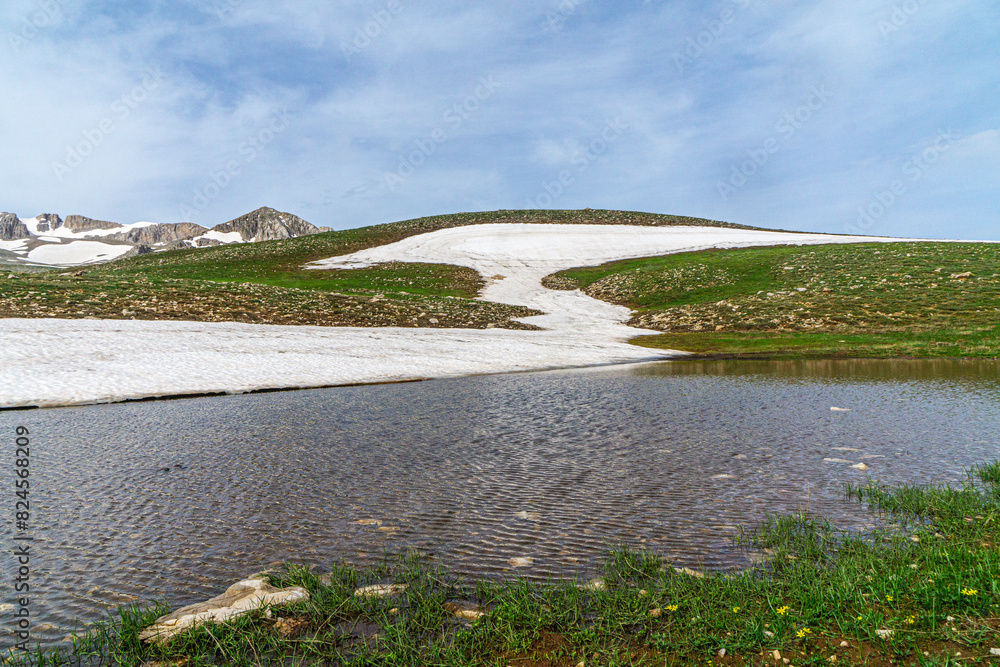 Scenic views of Eğrigöl Lake and Geyik Mount which is on the Söbüçimen Plateau at the foothills of the Geyik Mountains of the Taurus Mountains, on the border of Konya and Antalya.