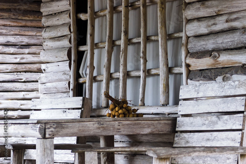 Vacation on the tropical sea. Wooden bungalow reed thatched roof waiting for tourists by the sea. Thailand