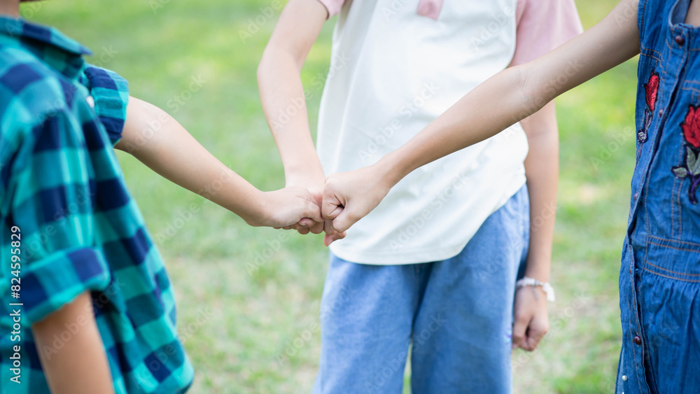 Fototapeta premium Closeup of diverse people holding hands
