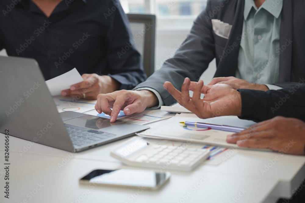 Business idea. Business people talking And calculations about charts and graphs showing the growth of investment results Of successful teamwork Business idea. Business people talking And calculations about charts and graphs showing the growth of investment results Of successful teamwork