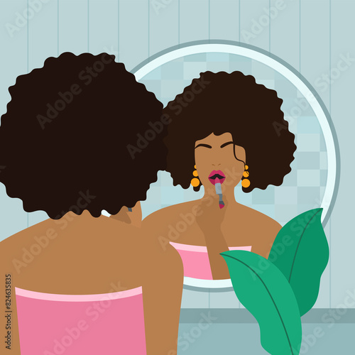 black woman putting on lipstick in front of the mirror (ID: 824635835)