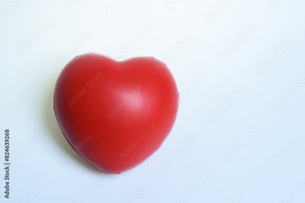 single red stress ball isolated on white background, heart shape toy single red stress ball isolated on white background, heart shape toy