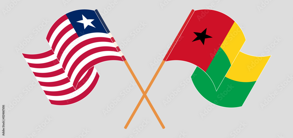 Crossed and waving flags of Liberia and Guinea-Bissau Crossed and waving flags of Liberia and Guinea-Bissau