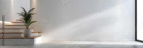 plant in a vase on a stair case in a room with a light coming through the window