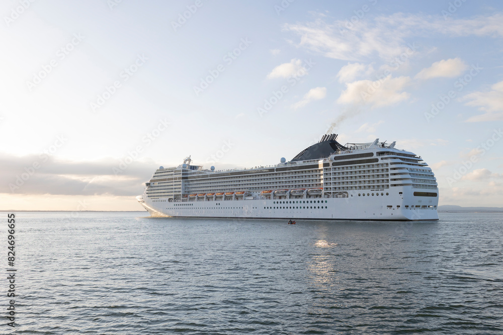 A large cruise ship with the letters MSC on the side A large cruise ship with the letters MSC on the side