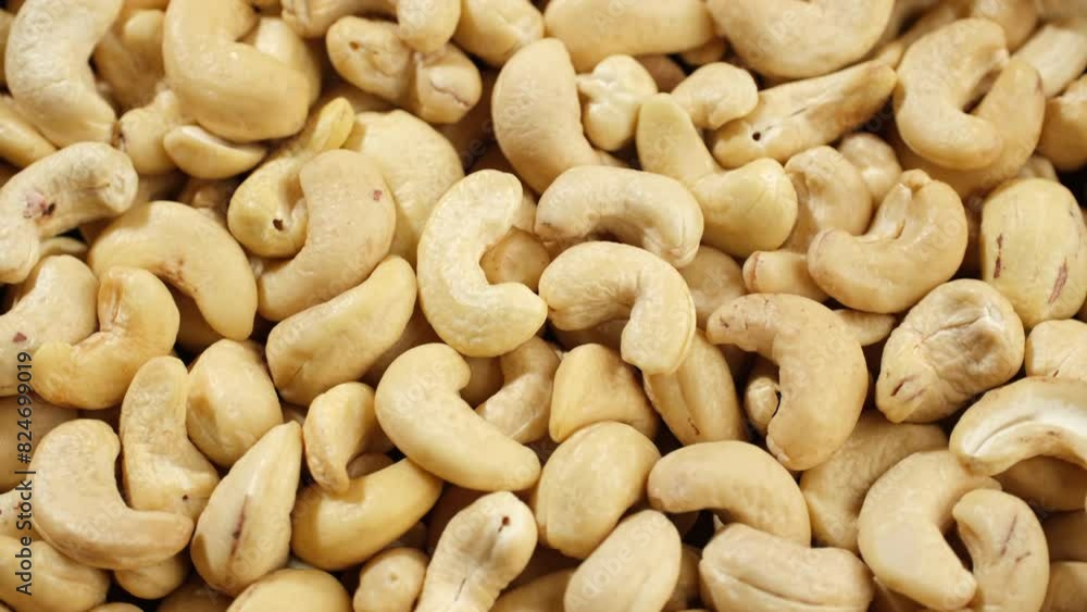 Zoom frame dried cashew nuts close up, rotation. Healthy Food concept Zoom frame dried cashew nuts close up, rotation. Healthy Food concept