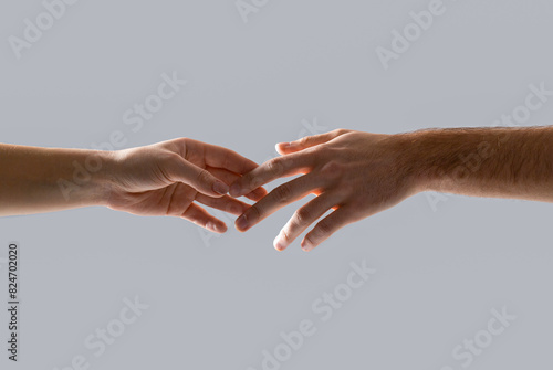 Hands of male and female holding together. Woman and man holding hands together. Giving a helping hand to another. Woman and man hand. Hands man and woman reaching to each other, support