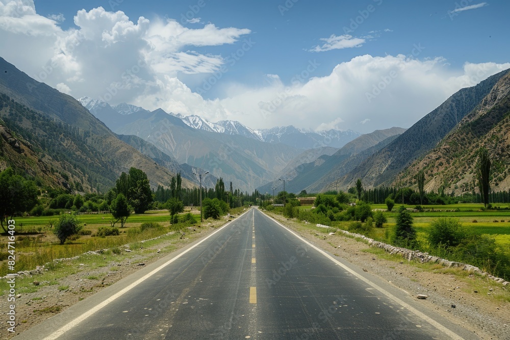 Mountain Street. Scenic Highland Road with Open Field in Summer Mountain Street. Scenic Highland Road with Open Field in Summer