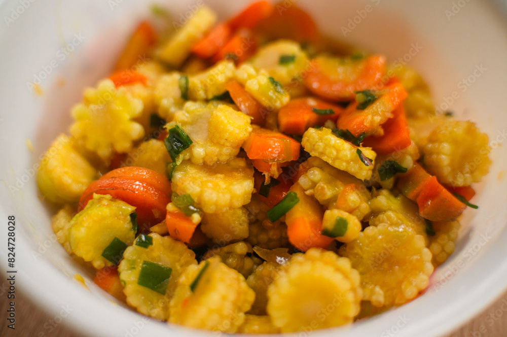 sauté carrots and baby corn sauté carrots and baby corn