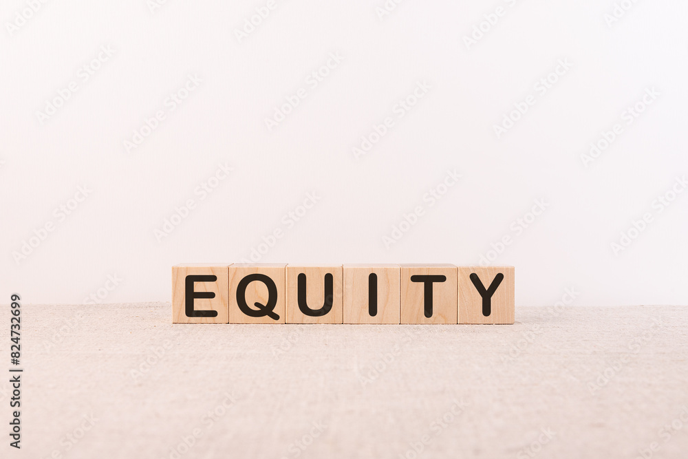EQUITY word made with building blocks on a light background EQUITY word made with building blocks on a light background