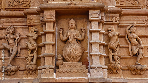 Carving Sculpture of Lord Vishnu in Fire on Vishnu Temple, Mangalay Temples, Ratlam, Madhya Pradesh India. photo