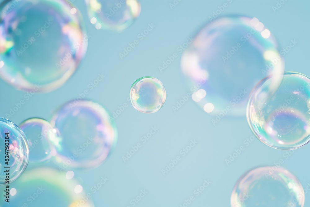 Tranquil scene of delicate soap bubbles floating gracefully with a pastel blue background. The image captures the iridescent surface and ephemeral beauty of each bubble in soft, diffused light
