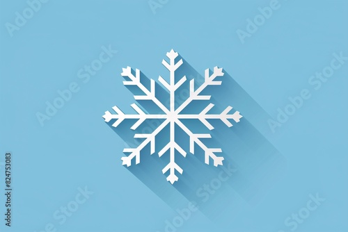 a white snowflake on a blue background photo