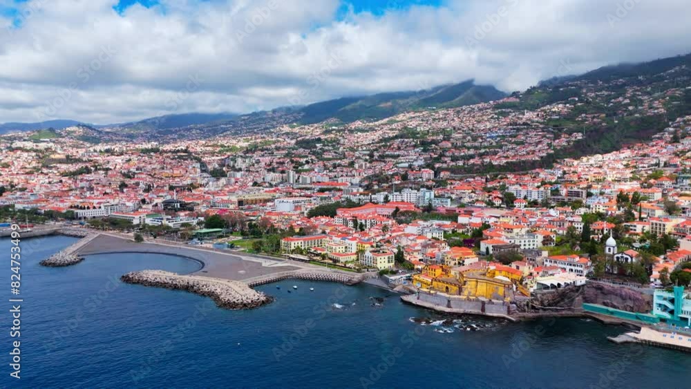 Cityscape of Funchal on Madeira island on Atlantic ocean coast, Portugal island in ocean. Aerial view Cityscape of Funchal on Madeira island on Atlantic ocean coast, Portugal island in ocean. Aerial view