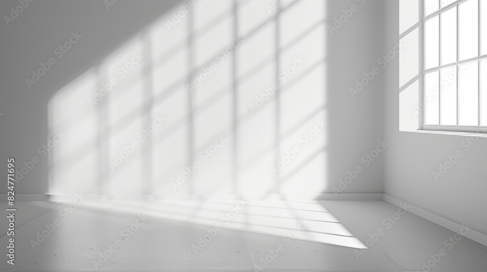 White minimal wall with light shadows from a window White minimal wall with light shadows from a window