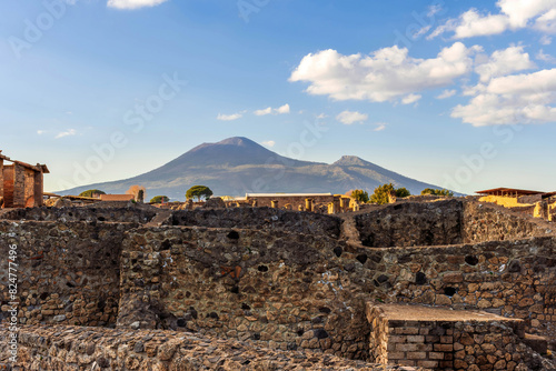 beautiful landscape from Pompeii ancient archeological excavation to Vesuvius volcano  and amazing cloudy cky on background