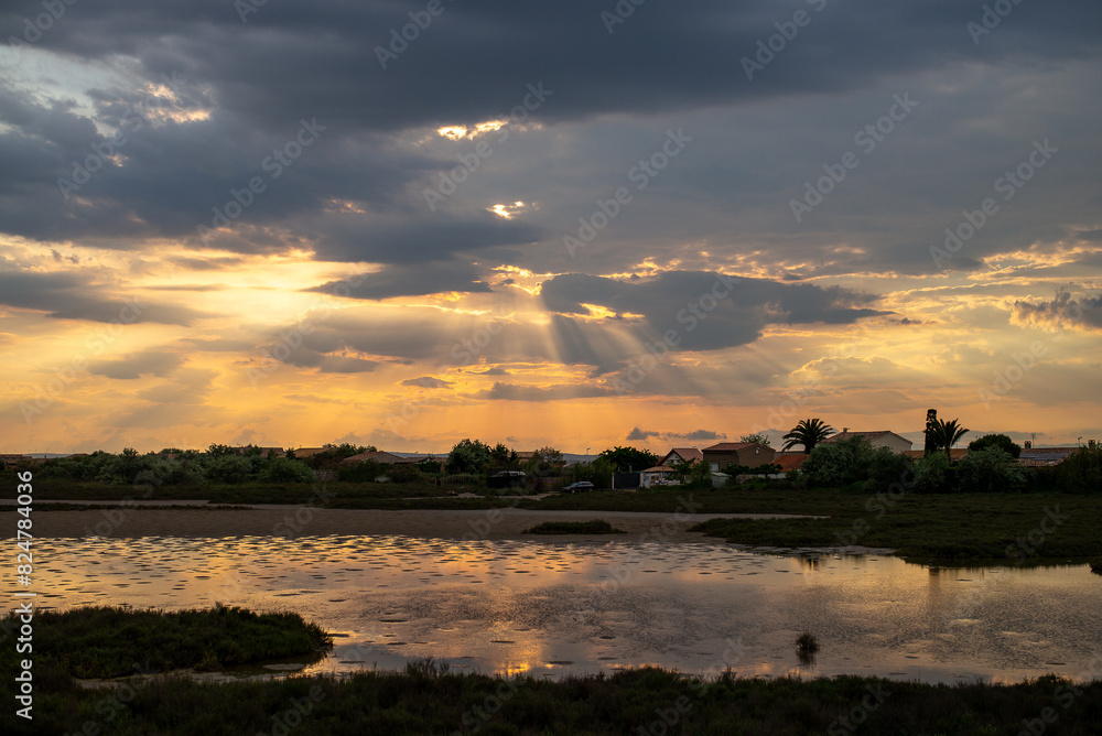 Naklejka premium sunset over the river