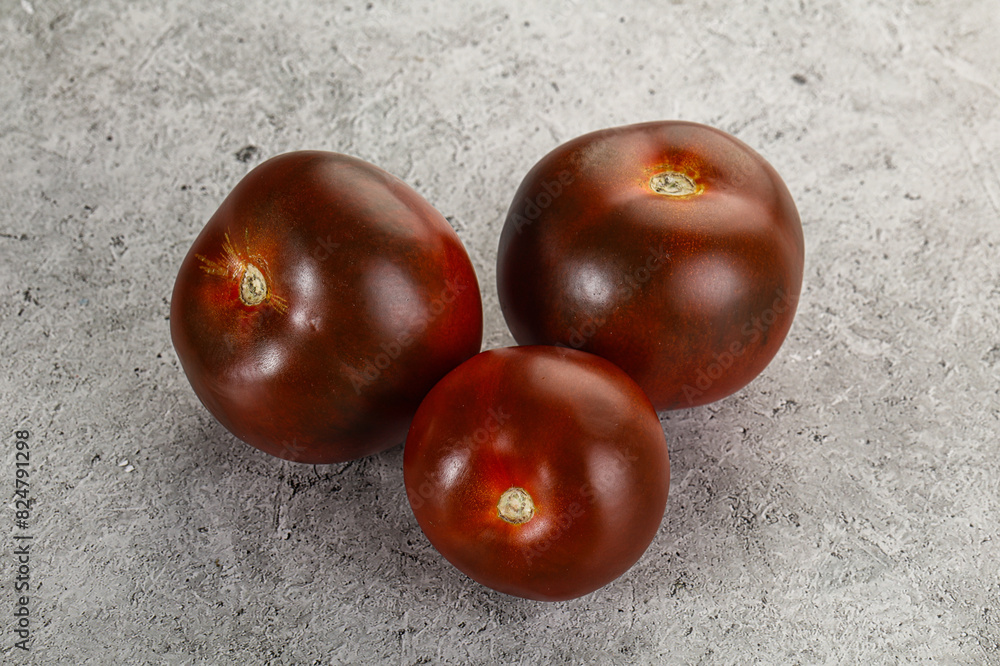 Obraz premium Organic natural juicy Kumato tomato
