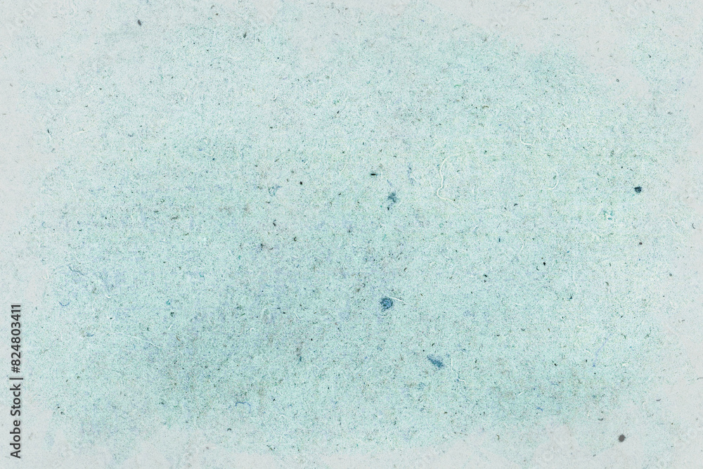 Handmade paper enlarged and saturated. The color has been changed in light blue. Grunge structure Handmade paper enlarged and saturated. The color has been changed in light blue. Grunge structure