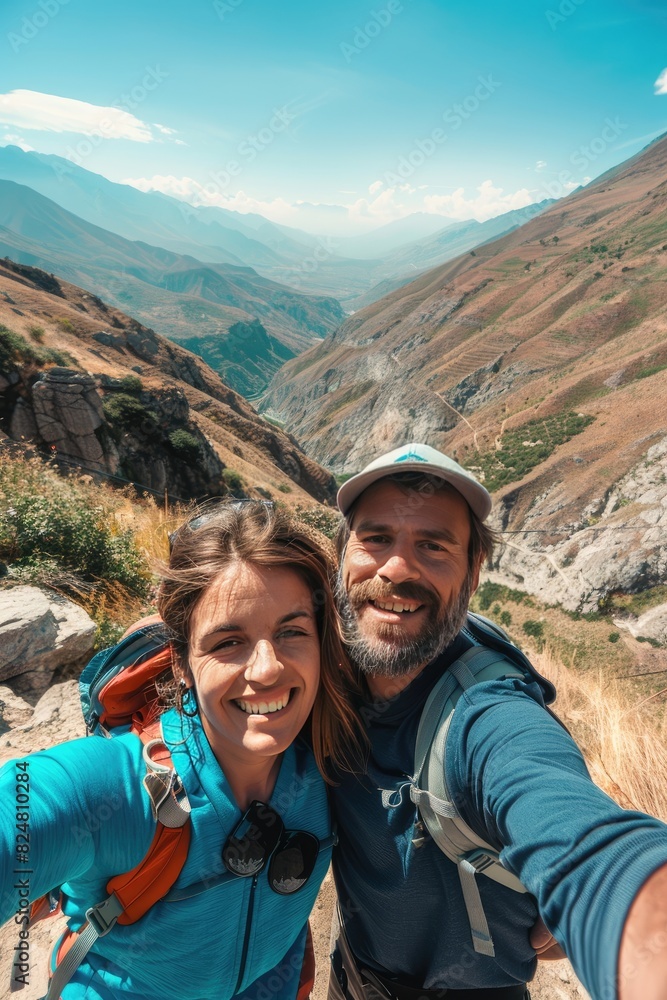 a couple in love takes a selfie against the background of mountains. Selective focus a couple in love takes a selfie against the background of mountains. Selective focus