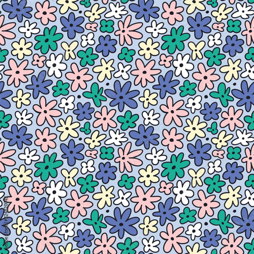 vector cute floral seamless pattern. Stylized colorful ditsy flower print. Beatufil seamless pattern design for fabric or wallpaper, wrapping paper. Simple daisy on blue background. photo