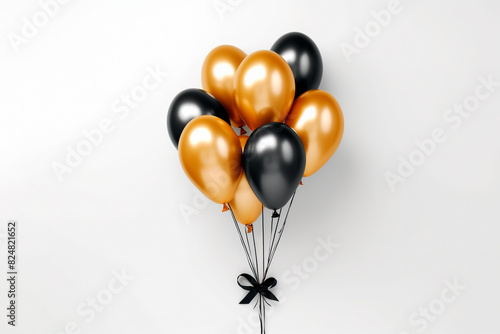 Golden and black balloons on white background, space for text. Festive decoration, Bunch of gold balloons background