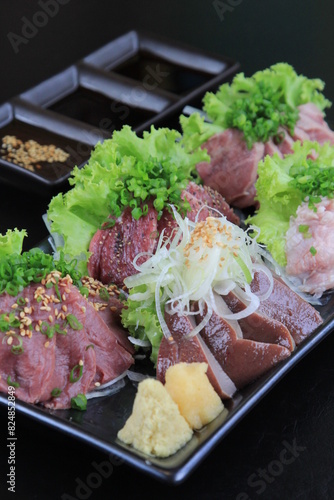 Japanese style raw meat menu with various parts