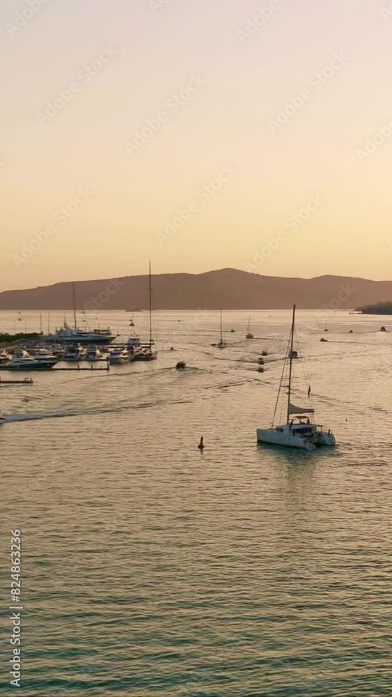 Seascape on a sunny summer evening from above at sunset. Vertical Video Seascape on a sunny summer evening from above at sunset. Vertical Video