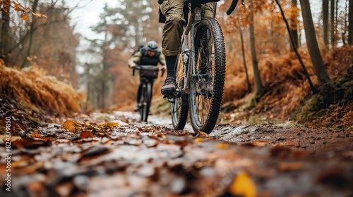 person riding a bike in autumn park