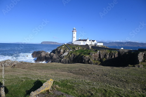 lighthouse on the coast photo