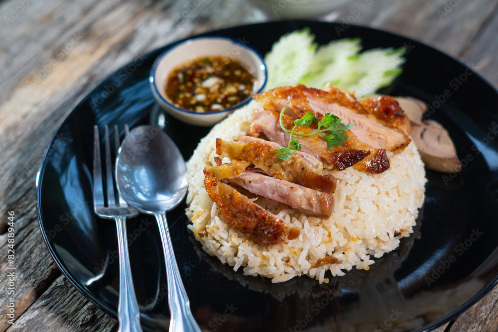 A steamed rice topped with chicken ( Khao Mun Gai ) Thai food A steamed rice topped with chicken ( Khao Mun Gai ) Thai food