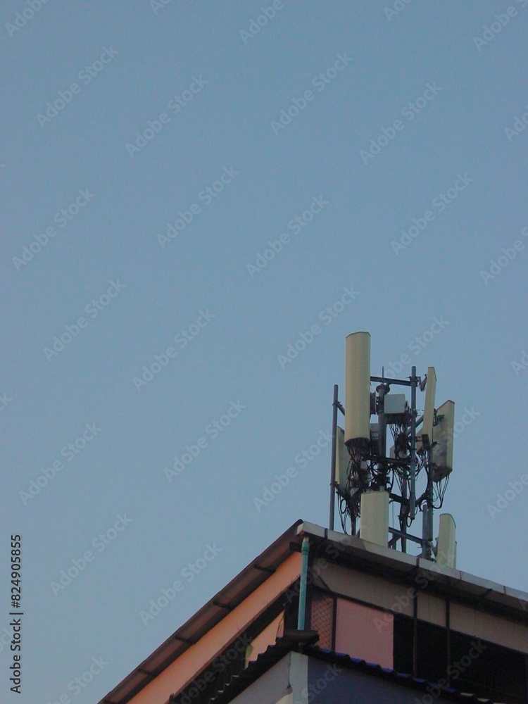 Roofs and telephone towers | Evening sky | Dust Roofs and telephone towers | Evening sky | Dust