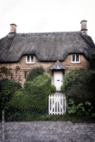 Cotswold Cottages In The Sleepy Village Of Great Tew, Oxfordshire photo