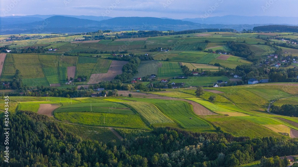 Lesser Poland rolling hills and rural landscape near Ciezkowice. Aerial drone view