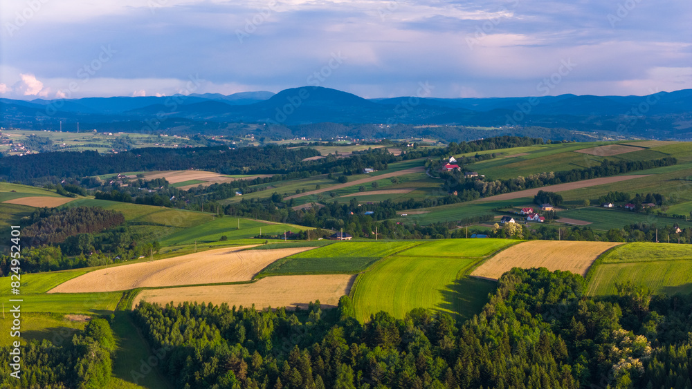 Lesser Poland rolling hills and rural landscape near Ciezkowice. Aerial drone view