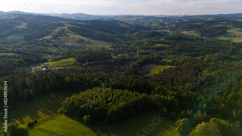 Lesser Poland rolling hills and rural landscape near Ciezkowice. Aerial drone view